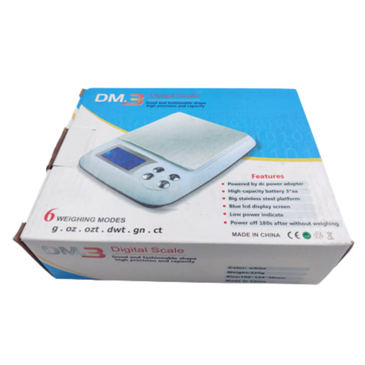 Box of DM.3 digital scale with features listed on a white background