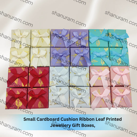 Small cardboard cushion ribbon leaf printed jewelry gift boxes in various colors on a white background.