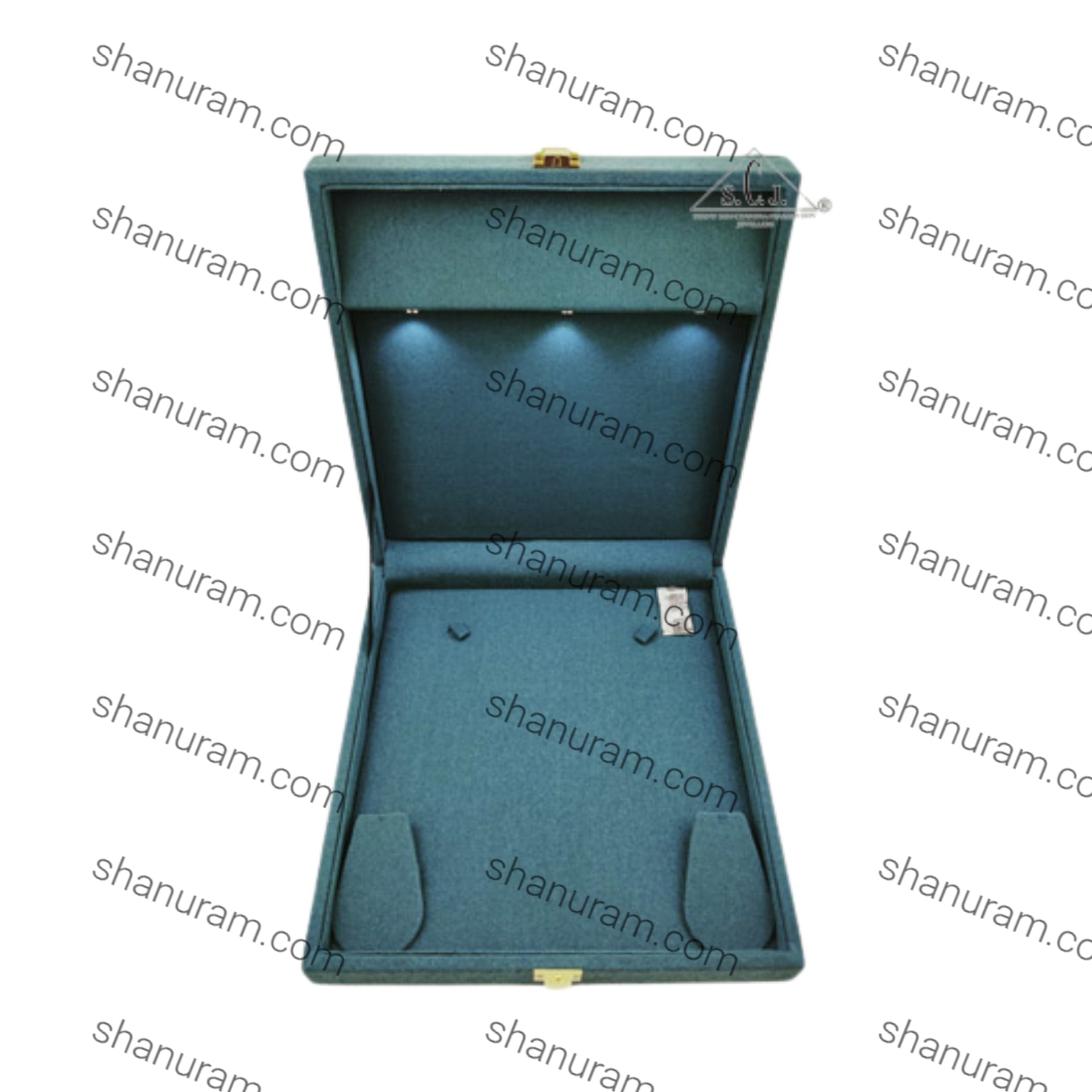 Open teal jewelry box on a white background with 'shanuram.com' watermark.