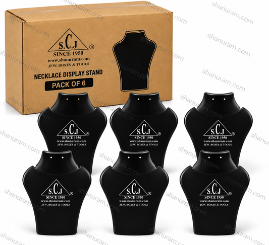 Six black necklace display busts arranged in front of a brown cardboard box labeled s.c.